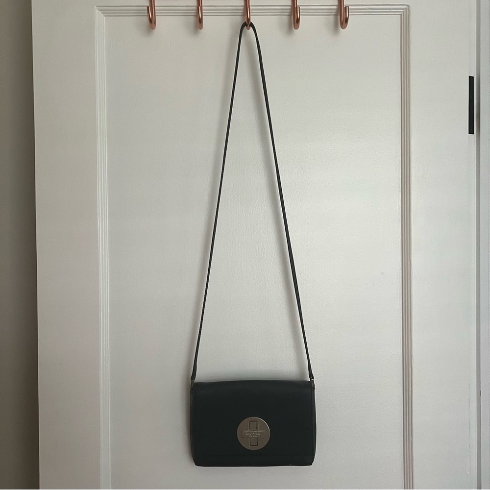 Kate Spade small, top flap crossbody purse in black